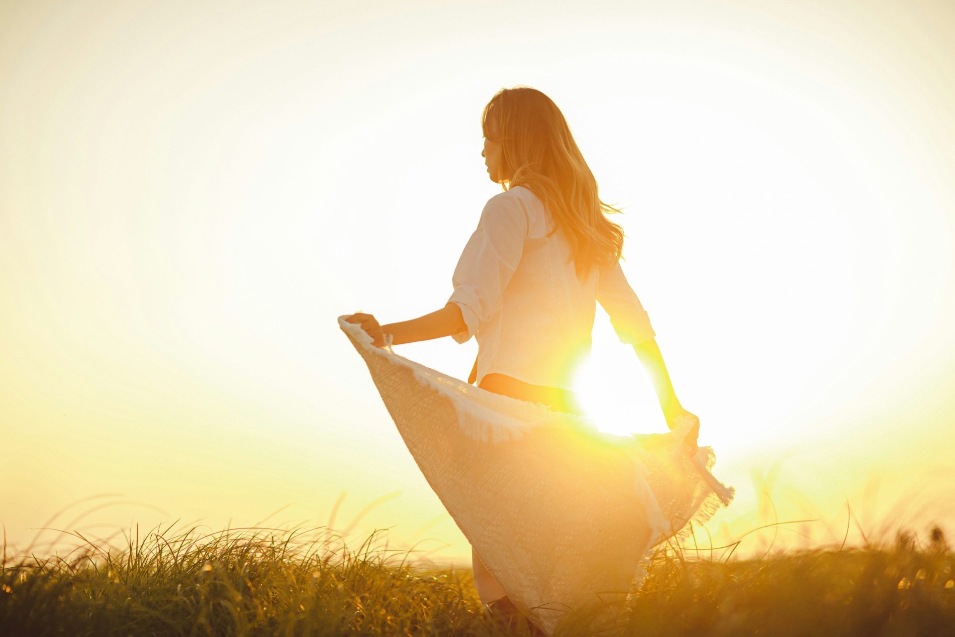 a person sitting in a field